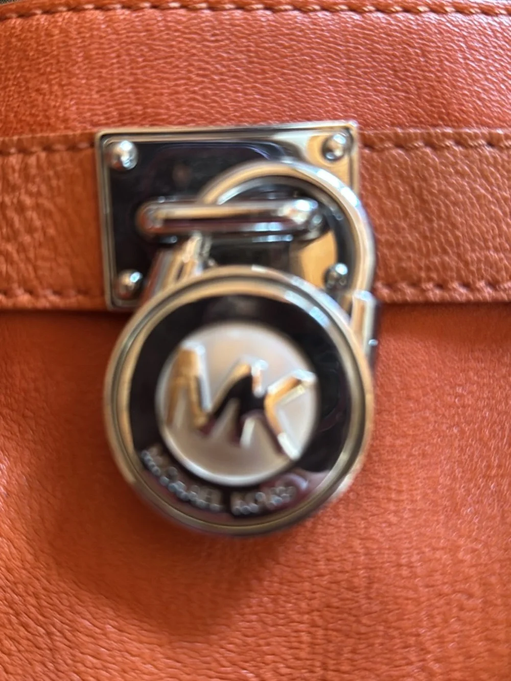 Michael Kors Orange Leather Satchel Handbag with Silver Hardware